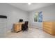 Bright home office with a large window and a desk with drawers at 1550 Pathway Dr, Carrboro, NC 27510