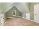 Slanted attic space featuring a charming arched window at 160 Sweet Pine Cir, Pittsboro, NC 27312