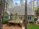 Back of the house with a nice deck area and a large, private backyard at 160 Sweet Pine Cir, Pittsboro, NC 27312