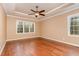 Bedroom with natural lighting and beautiful hardwood flooring at 160 Sweet Pine Cir, Pittsboro, NC 27312