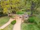 Community pavilion features seating area, fireplace, and pond at 160 Sweet Pine Cir, Pittsboro, NC 27312