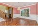 Elegant dining room featuring a crystal chandelier and classic wainscoting at 160 Sweet Pine Cir, Pittsboro, NC 27312