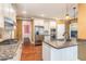 Well-lit kitchen with modern appliances and granite countertops at 160 Sweet Pine Cir, Pittsboro, NC 27312
