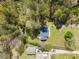 Aerial view of a home showcasing its location, expansive yard, and surrounding neighborhood at 163 Ridge Way Ln, Clayton, NC 27520