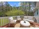 Relaxing deck with comfortable outdoor seating, ideal for entertaining or enjoying peaceful views at 163 Ridge Way Ln, Clayton, NC 27520
