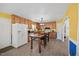 Spacious eat-in kitchen offering wood cabinets, stainless appliances, and a center island at 163 Ridge Way Ln, Clayton, NC 27520