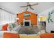 Inviting living room with a fireplace, vaulted ceiling, and a view to the adjacent dining area at 163 Ridge Way Ln, Clayton, NC 27520