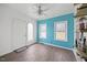 Comfortable living room with decorative windows and tile floors at 163 Ridge Way Ln, Clayton, NC 27520
