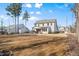 Expansive backyard offering privacy, space for recreation, and potential for landscaping or expansion at 201 W Amber Oak Drive, Selma, NC 27576