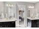 Bright bathroom with double vanities and a view into the bedroom at 201 W Amber Oak Drive, Selma, NC 27576