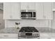Modern kitchen features stainless steel gas range at 201 W Amber Oak Drive, Selma, NC 27576