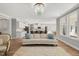 Open-concept living room and kitchen with a chandelier at 201 W Amber Oak Drive, Selma, NC 27576
