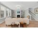 Cozy living room featuring a fireplace and stairs at 201 W Amber Oak Drive, Selma, NC 27576