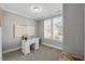 Bright office with neutral walls, a neat desk, and natural light streaming through the window at 201 W Amber Oak Drive, Selma, NC 27576