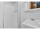 Bright white bathroom with shower, sink, and vanity providing a clean and functional space at 207 High House Rd, Cary, NC 27513