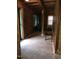 View of an interior hallway with wood paneled walls at 207 High House Rd, Cary, NC 27513