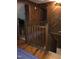 Upper hallway featuring wood accents, stairs, and access to rooms at 207 High House Rd, Cary, NC 27513