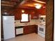 Bright kitchen features white appliances and ample counter space for easy meal preparation at 207 High House Rd, Cary, NC 27513