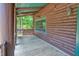Cozy front porch with a swing, perfect for relaxing and enjoying the outdoors at 207 High House Rd, Cary, NC 27513