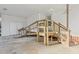 Back porch features ramp and stairs, white siding and brick accents at 209 High House Rd, Cary, NC 27513