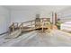 Outdoor ramp leads to back porch, featuring white siding and brick accents at 209 High House Rd, Cary, NC 27513