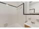 Bathroom with white tile and a classic vanity at 209 High House Rd, Cary, NC 27513