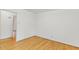 Bright bedroom features hardwood floors and a neutral color scheme at 209 High House Rd, Cary, NC 27513