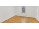 Bedroom with hardwood floors and a window at 209 High House Rd, Cary, NC 27513