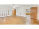 Open living area with hardwood floors, and access to the kitchen at 209 High House Rd, Cary, NC 27513