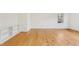Bright living room with hardwood floors and built-in shelving at 209 High House Rd, Cary, NC 27513