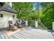 Spacious back deck with outdoor seating and views of the landscaped backyard at 2105 White Oak Rd, Raleigh, NC 27608