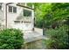 Spacious garage with a convenient side entry, complemented by a fenced yard and landscaped surroundings at 2105 White Oak Rd, Raleigh, NC 27608