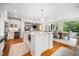 Bright kitchen with granite countertops, large island, stainless appliances and an open floor plan at 2105 White Oak Rd, Raleigh, NC 27608