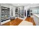 Well-organized walk-in closet with custom shelving and ample storage space for shoes and clothing at 2105 White Oak Rd, Raleigh, NC 27608