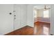 Welcoming entryway featuring hardwood floors and access to multiple rooms at 2106 Ruffin St, Durham, NC 27704
