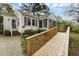 Charming home with a wooden ramp and screened porch, offering accessibility and outdoor enjoyment at 2106 Ruffin St, Durham, NC 27704
