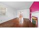 Spacious living room with beautiful hardwood floors and a cozy fireplace at 2106 Ruffin St, Durham, NC 27704