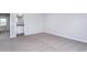 Neutral carpeted bedroom, showing ensuite bathroom at 2114 Willow Gln Dr, Graham, NC 27253