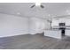 Spacious open-concept living space, featuring hardwood floors, connecting the kitchen and living areas at 2114 Willow Gln Dr, Graham, NC 27253