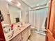 Cozy bathroom featuring a shower, vanity, and stylish decor at 212 Columbia W Pl, Chapel Hill, NC 27516