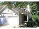 Charming home featuring an attached two-car garage and inviting front entrance at 212 Columbia W Pl, Chapel Hill, NC 27516