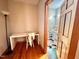 Cozy office space connected to a bathroom, with a desk and natural light at 212 Columbia W Pl, Chapel Hill, NC 27516