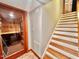 Staircase leading upstairs adjacent to sauna at 212 Columbia W Pl, Chapel Hill, NC 27516