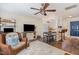 Open-concept living area with a spacious layout, modern furnishings, and a seamless flow to the kitchen at 2225 Whistling Straits Way, Raleigh, NC 27604