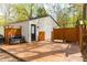 Wooden deck with privacy screen, bench, and access to the backyard at 2400 Perennial St, Raleigh, NC 27603