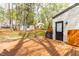 Enjoy the wooden deck and sheds in this private, treed backyard at 2400 Perennial St, Raleigh, NC 27603