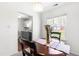 Bright breakfast nook features a round table and chairs set by a sunlit window at 2400 Perennial St, Raleigh, NC 27603