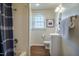 Cozy bathroom features a shower-tub combination and a modern vanity with ample storage at 2422 S Alston Ave, Durham, NC 27713