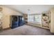 Laundry room featuring modern machines, built-in shelving, and natural light at 2422 S Alston Ave, Durham, NC 27713