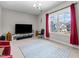 Bonus room with large window, television area, and ample light at 2713 Tunstall Grove Dr, Apex, NC 27523